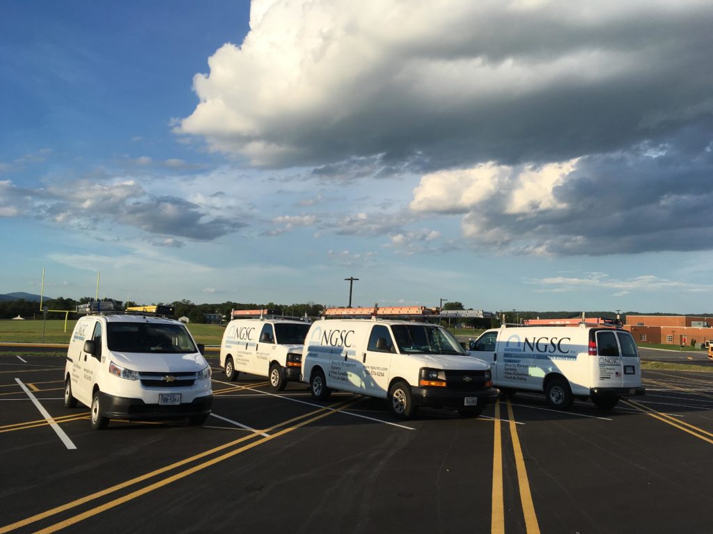 next generation security concept vans in a parking lot