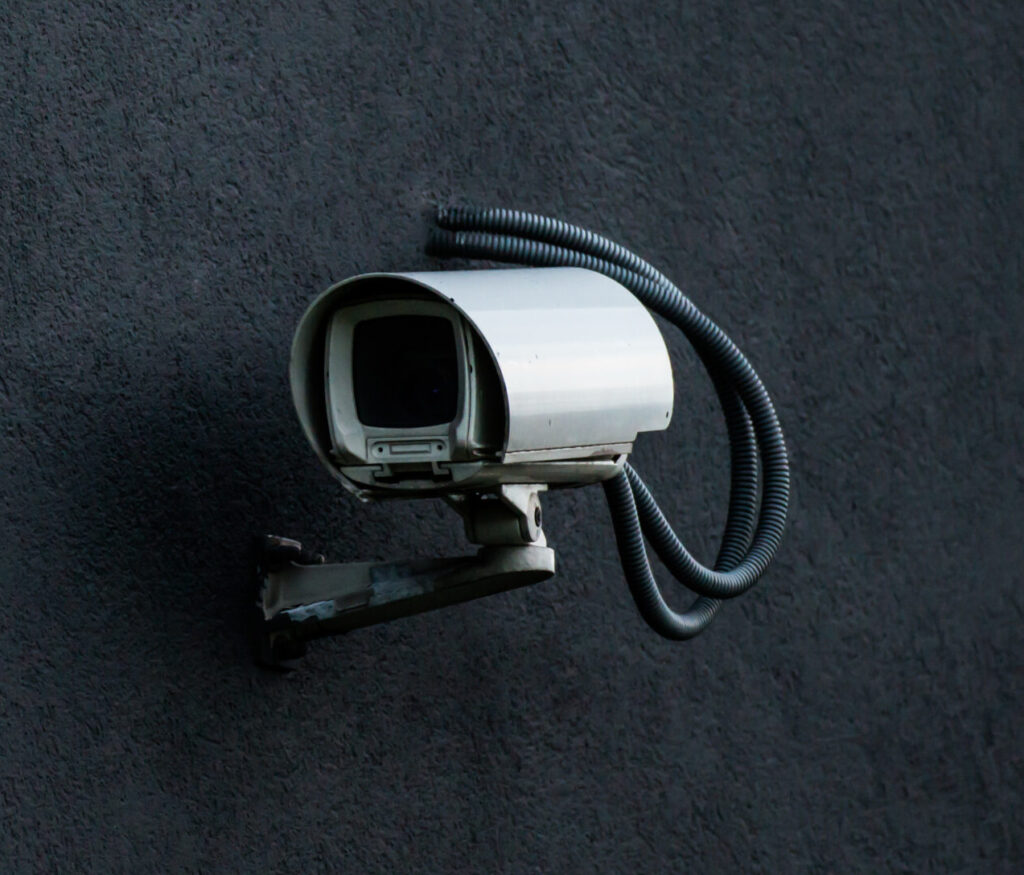security camera on black wall