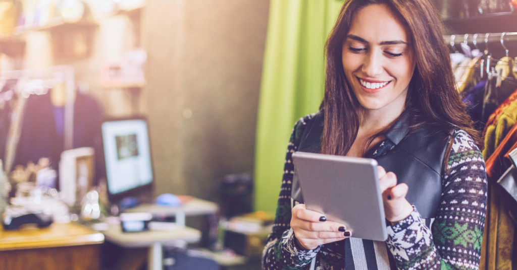 small business owner looking at her business security on her ipad